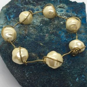 Vintage wire wrapped pearls with brass wiring